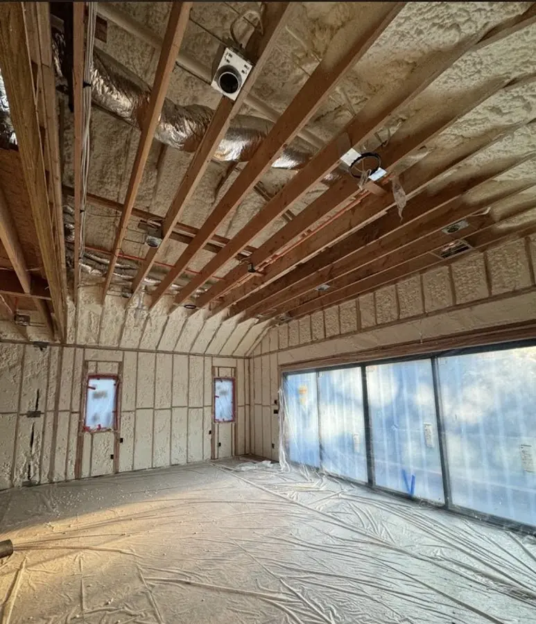 Interior walls and ceiling insulated with spray foam during new construction in Poplar Bluff